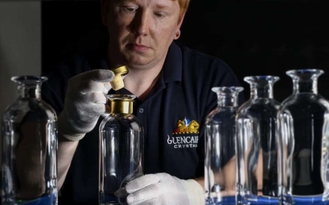 crafted engraving a message into a personalised whisky glass